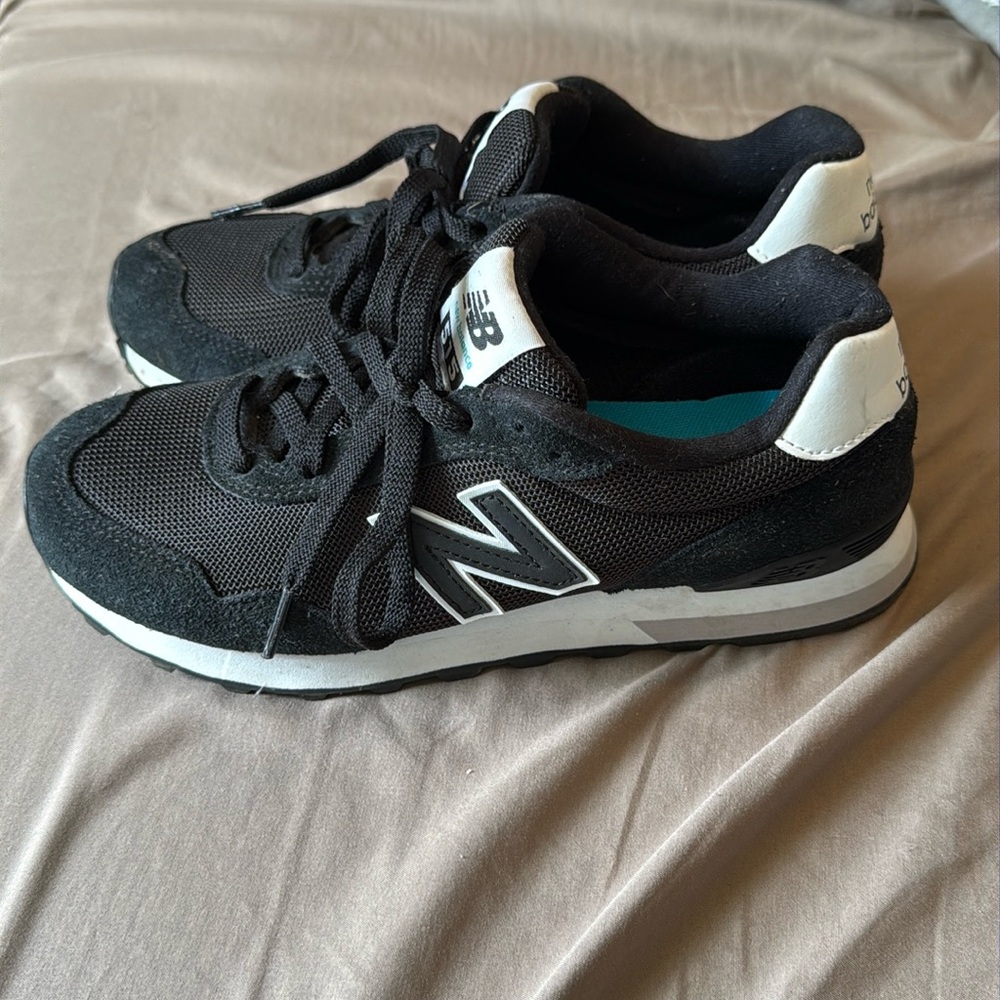 New Balance Black and White Athletic Shoes